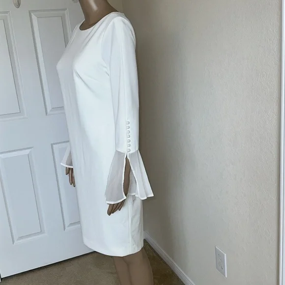 Elegant Calvin Klein White Dress with Flared Sleeves. - Picture 3 of 15